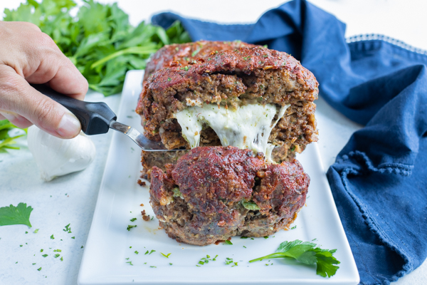 Mozzarella Stuffed Italian Meatloaf Recipe - Evolving Table