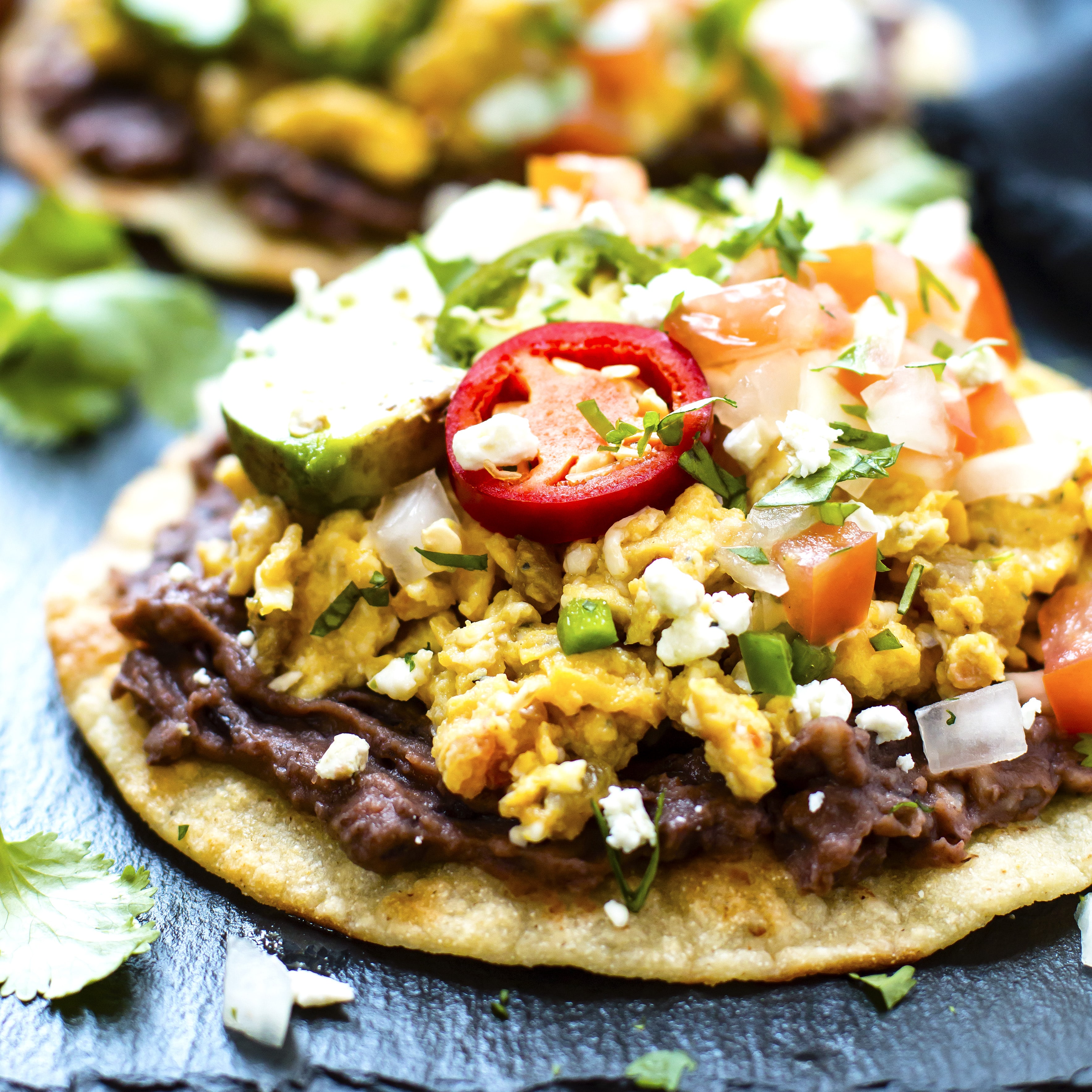 https://www.evolvingtable.com/wp-content/uploads/2017/08/Breakfast-Tostadas-sq.jpg