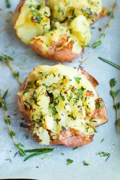 Ultra Crispy Smashed Potatoes with Garlic + Herbs - Evolving Table