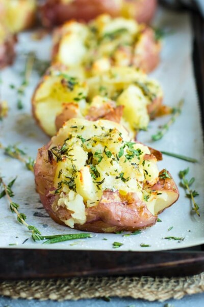 Ultra Crispy Smashed Potatoes With Garlic + Herbs - Evolving Table