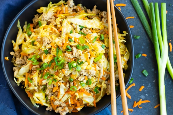 Paleo Egg Roll in a Bowl Recipe | This Egg Roll in a Bowl recipe is loaded with flavor and is a Paleo, Whole30, and keto recipe to make for an easy weeknight dinner.Ã‚Â  From start to finish, you can have this healthy and low-carb dinner recipe ready in under 30 minutes! It's a super easy and healthy ground turkey dinner recipe!