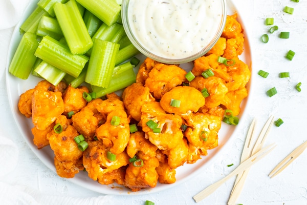 Easy Buffalo Cauliflower Bites Recipe - Evolving Table