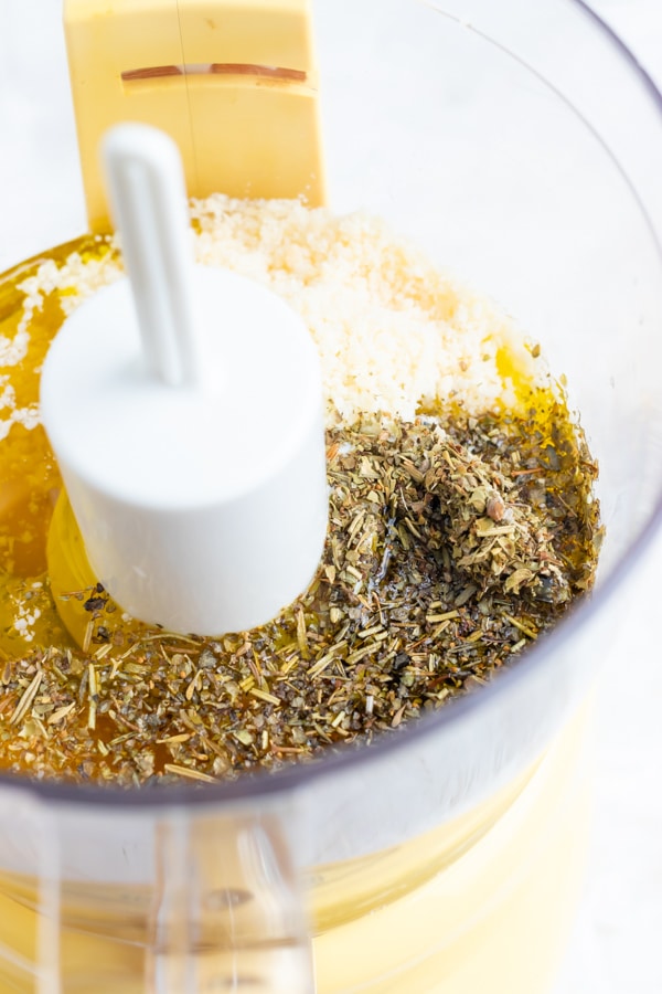 Homemade Italian salad dressing ingredients in a food processor.