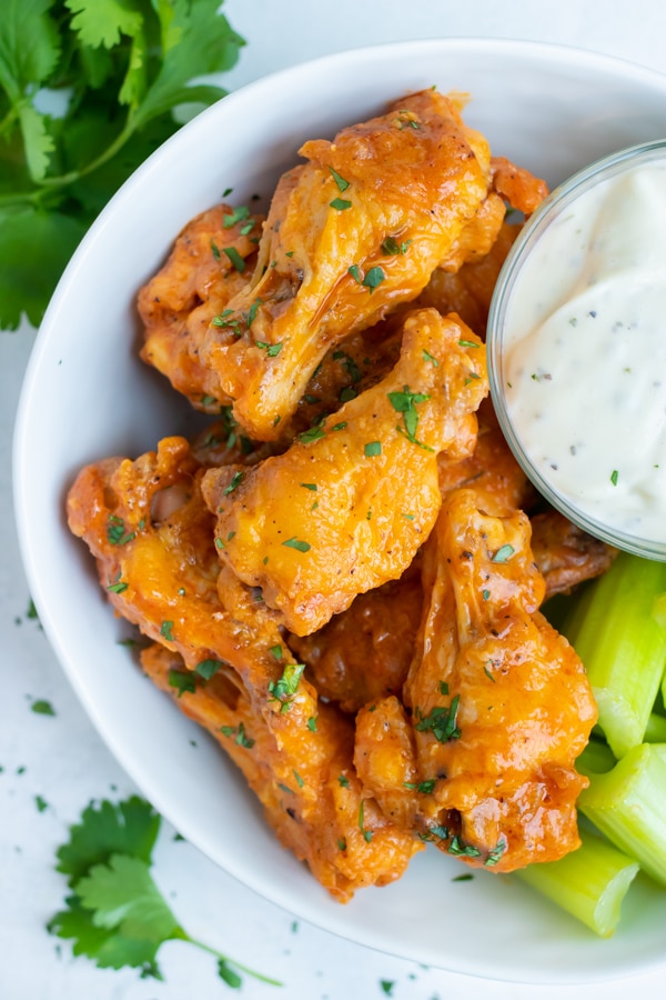 Baked Buffalo Chicken Wings Recipe (Ultra Crispy!) - Evolving Table