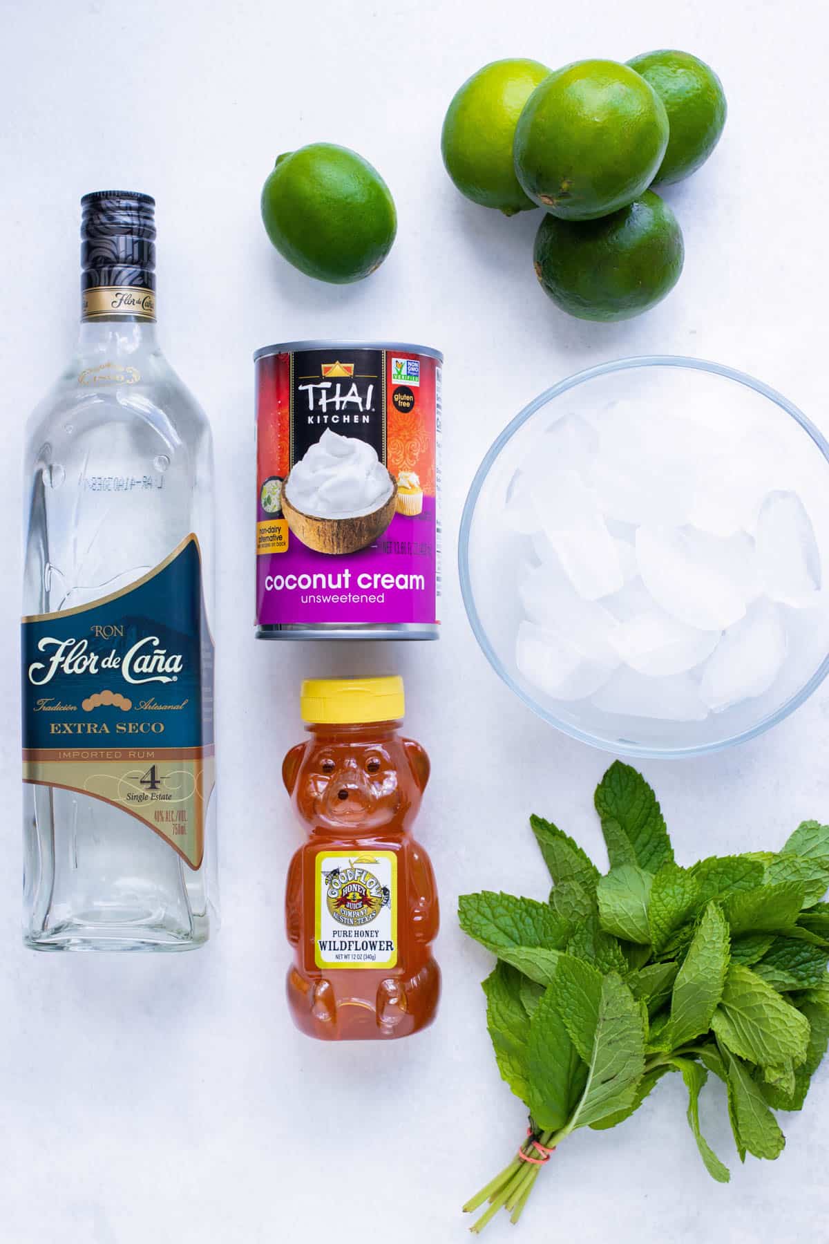 Best type of rums and sweeteners to use in a frozen mojito recipe.