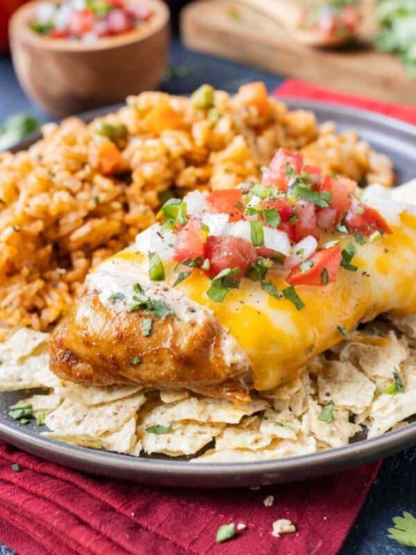 Fresh pico de gallo is placed on top of the fiesta lime chicken.