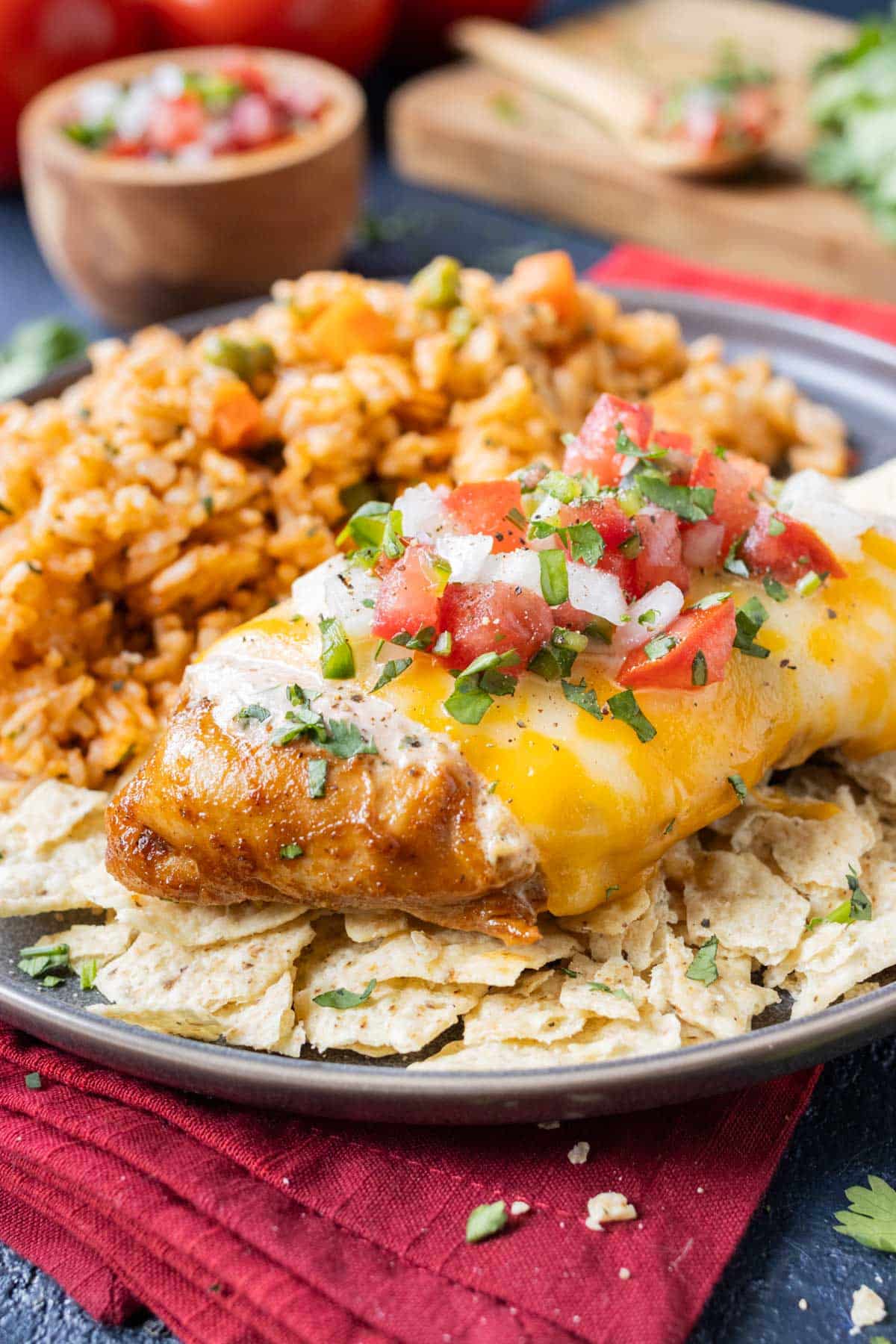 Fresh pico de gallo is placed on top of the fiesta lime chicken.