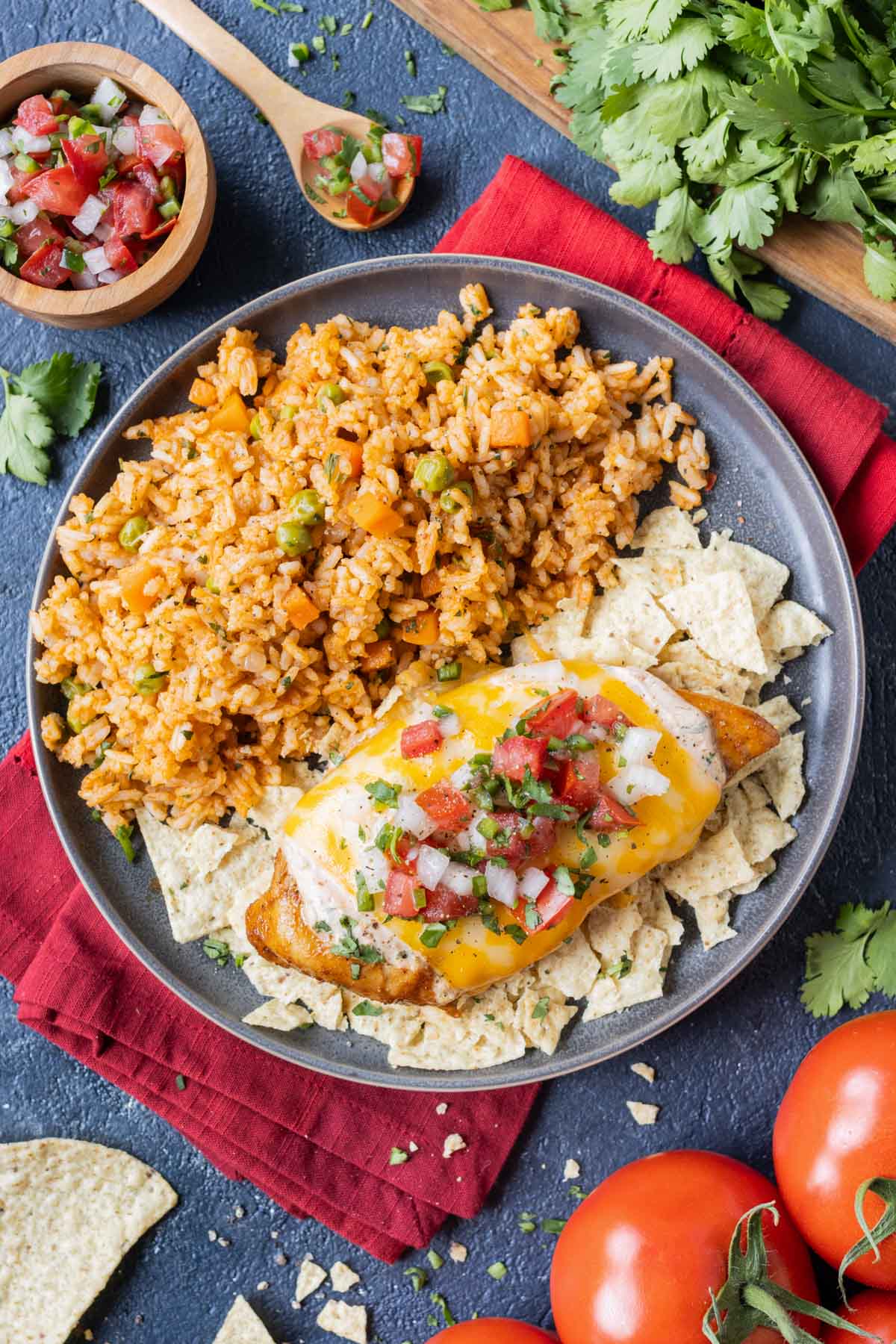 Fresh pico de gallo is placed on top of the fiesta lime chicken.