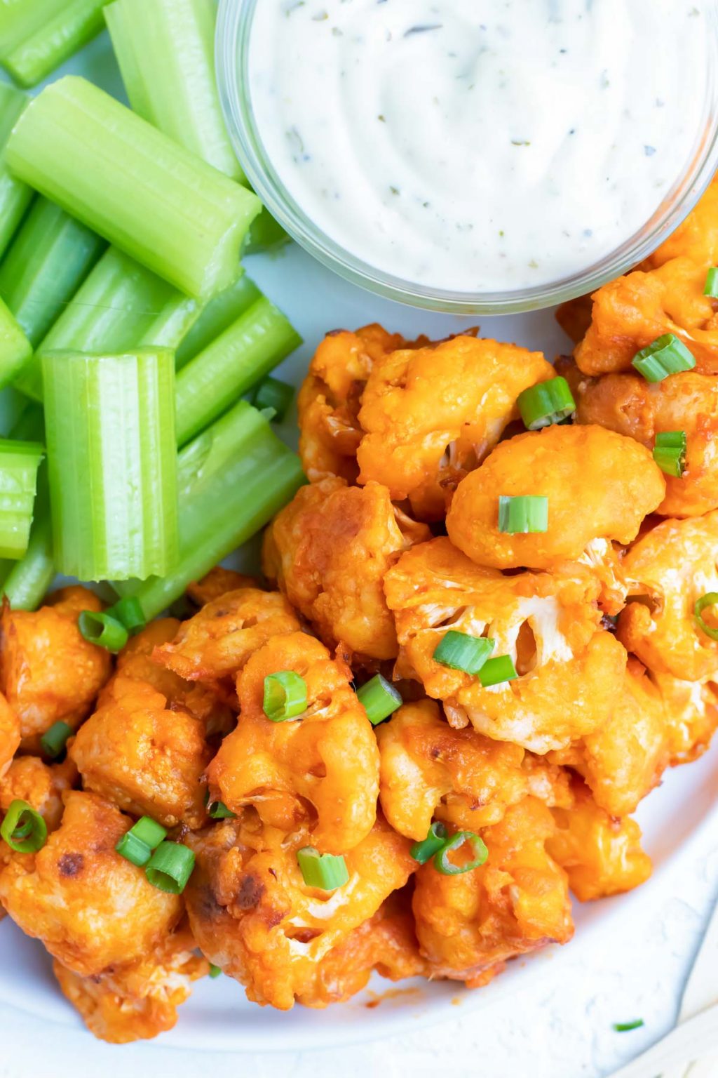 Easy Buffalo Cauliflower Bites Recipe - Evolving Table