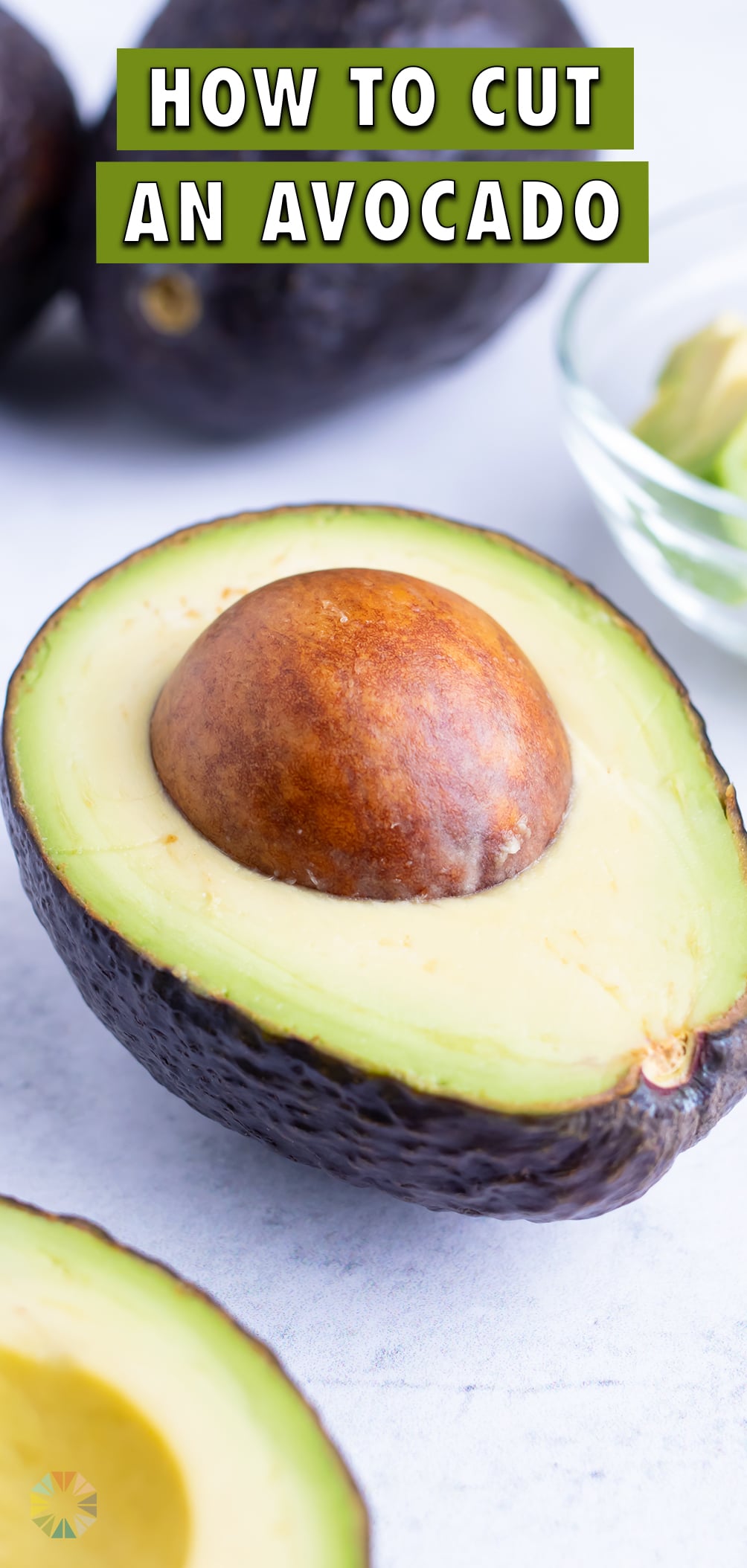 How To Cut An Avocado (The Easy Way!) - Evolving Table