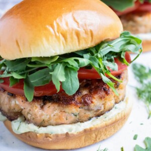 Salmon burgers are served for a healthy seafood dish.