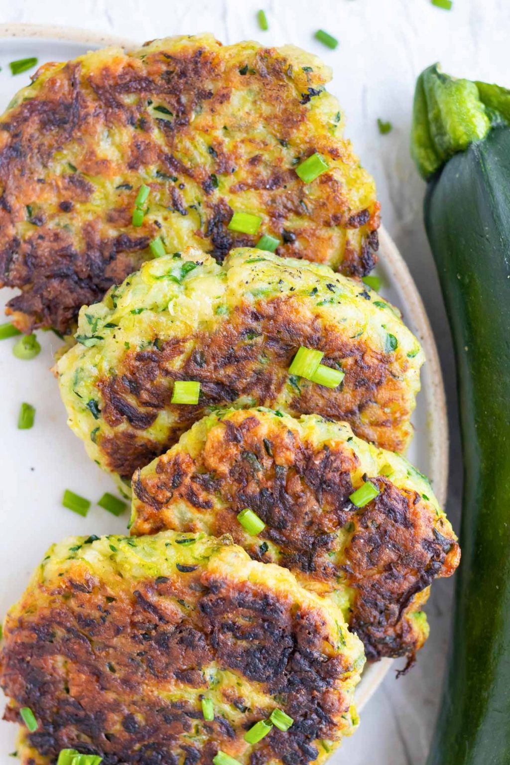 Crispy Zucchini Fritters Recipe - Evolving Table