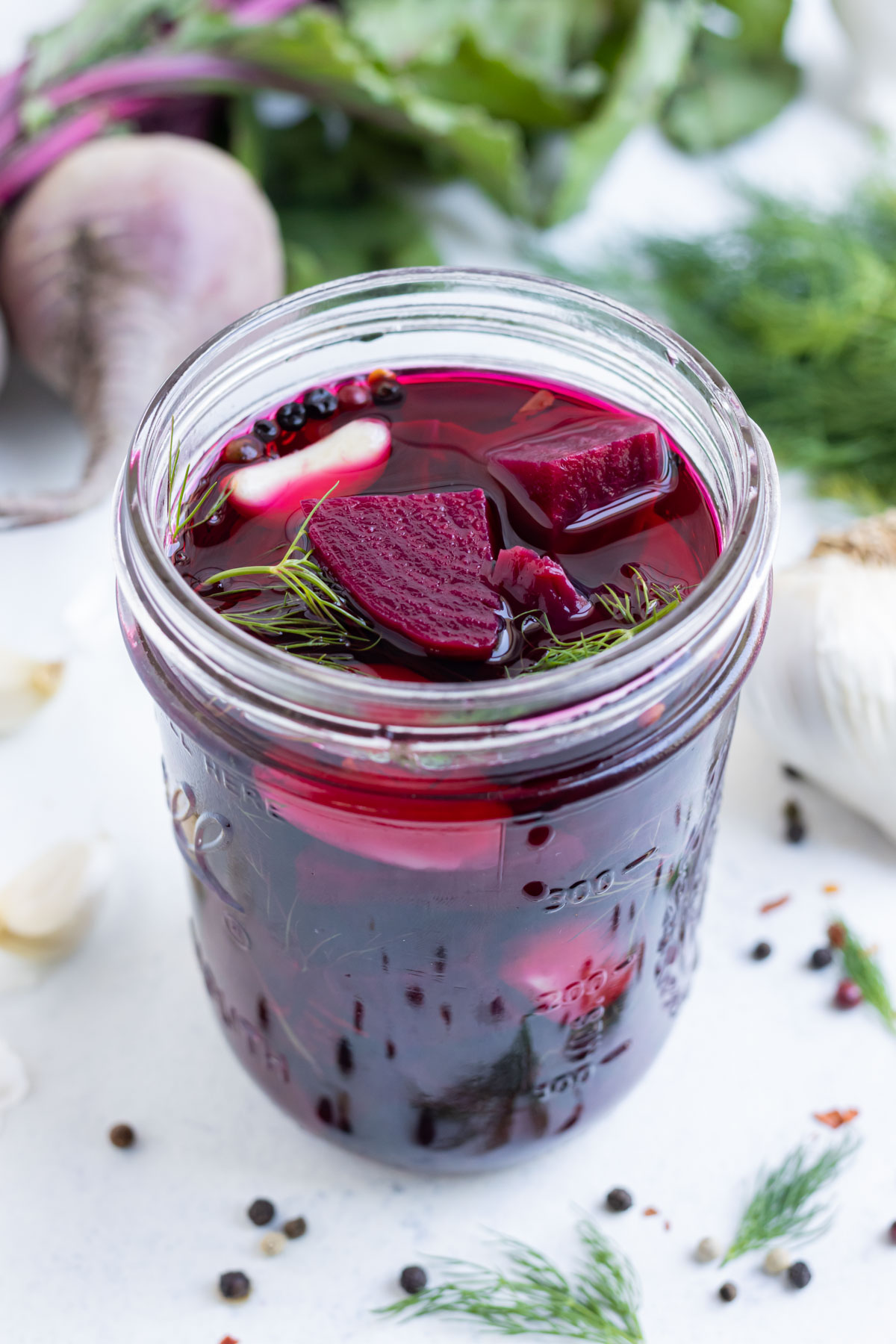 Pickled beets in a mason jar.