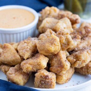 A plate is loaded with copycat Chick-fil-A nuggets.