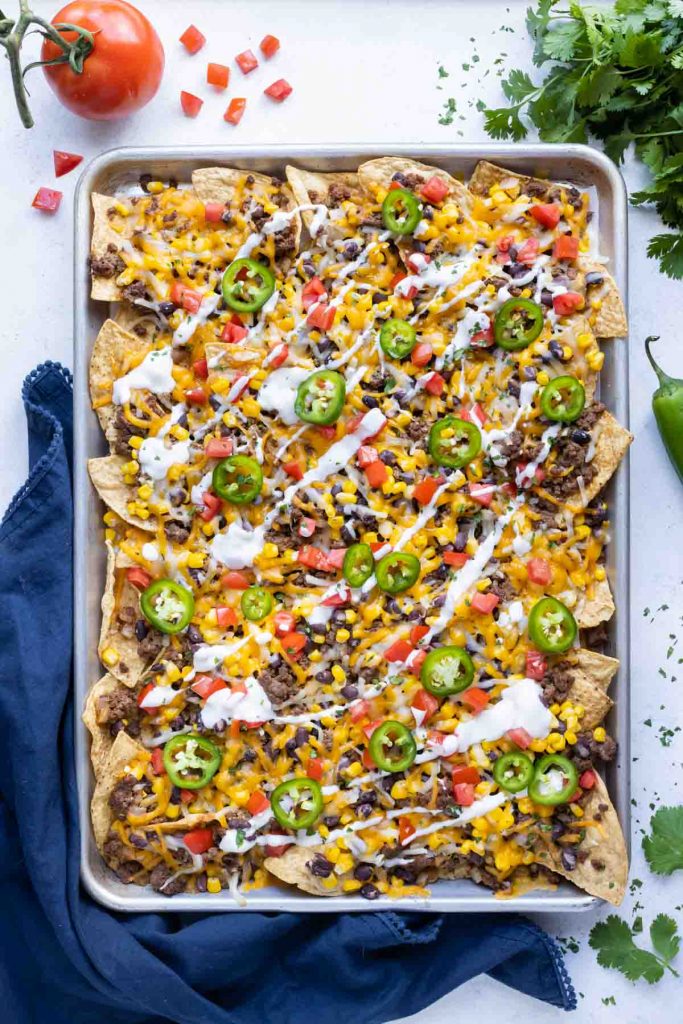 Easy Loaded Sheet Pan Nachos - Evolving Table