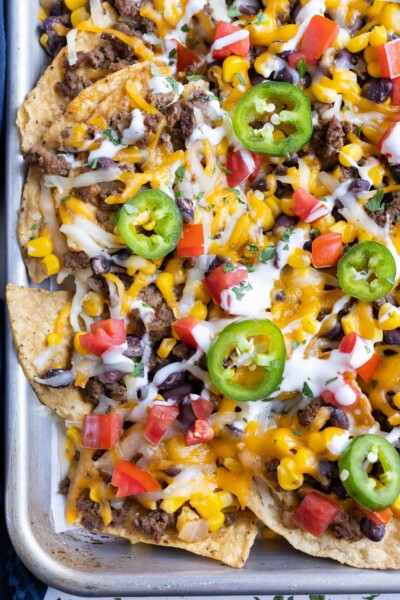 Sheet Pan Loaded Nachos Recipe - Evolving Table