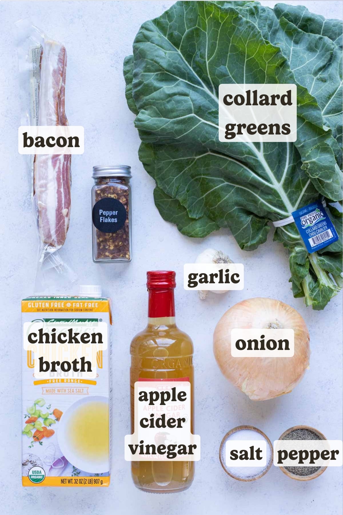 Collard greens, bacon, vinegar, broth, onion, garlic, seasonings are the ingredients for this recipe.