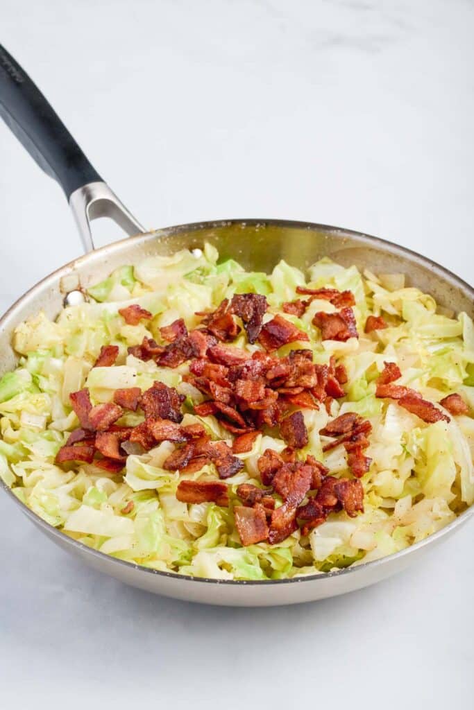 The bacon is added back into the mixture.