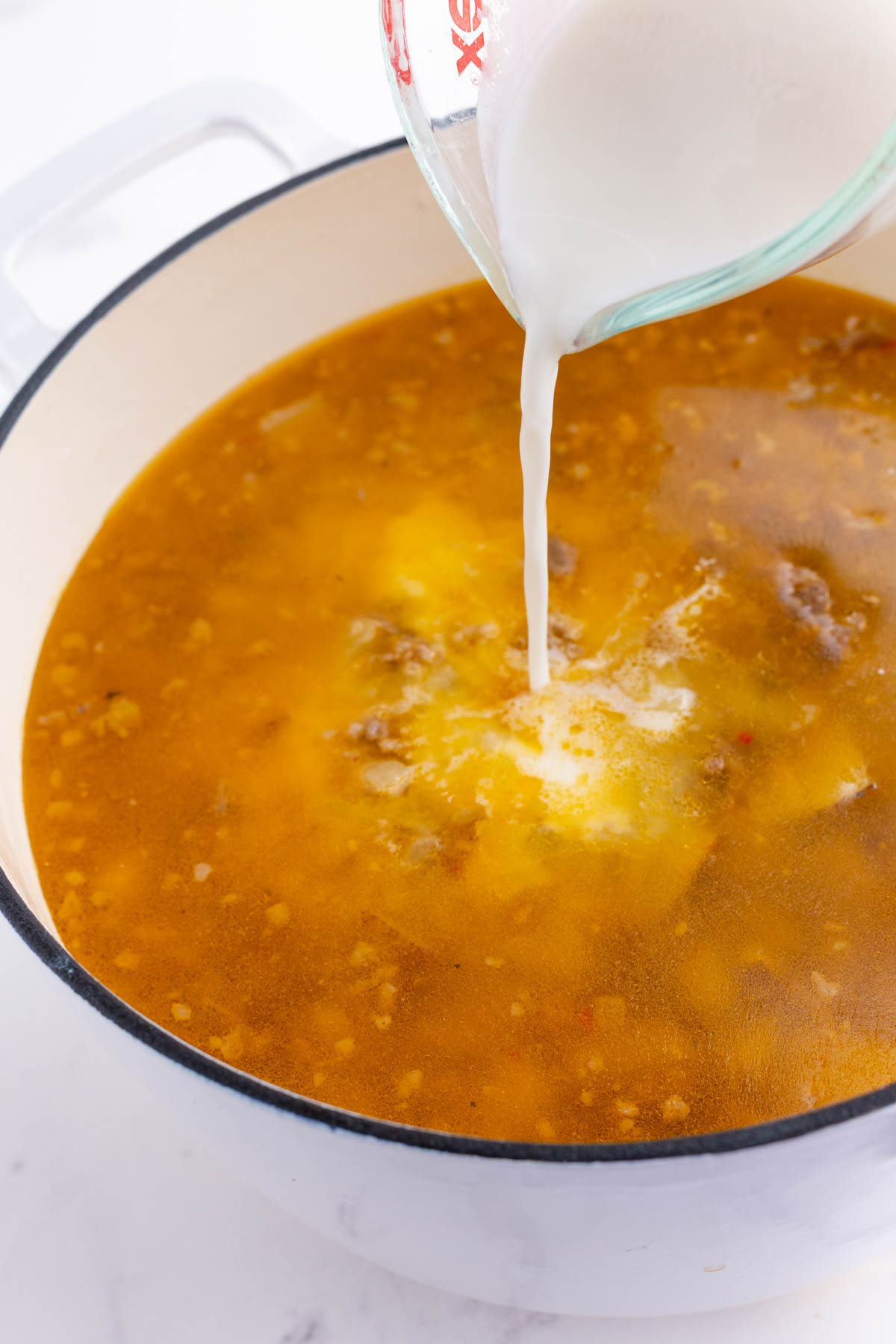 A starch slurry is added to the soup.