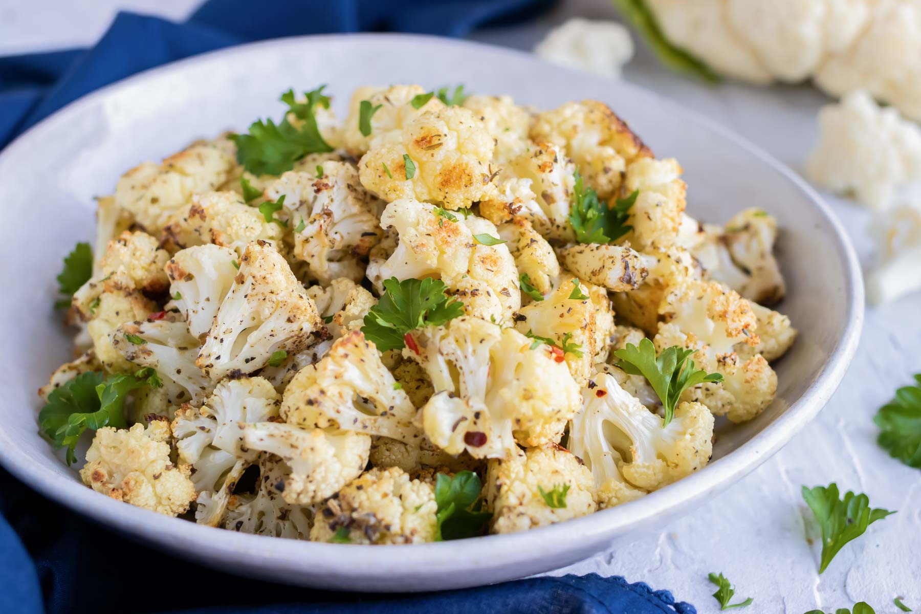 Oven-Roasted Cauliflower (4 Ways!) - Evolving Table