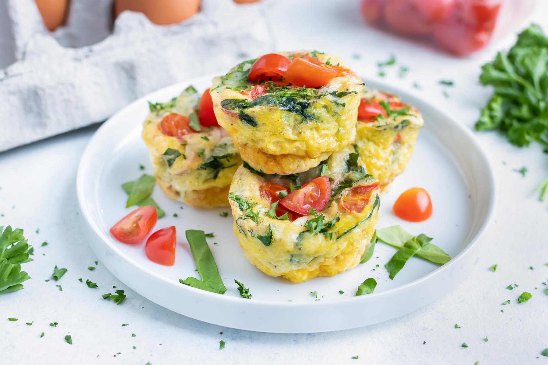 https://www.evolvingtable.com/wp-content/uploads/2023/03/Breakfast-Egg-Muffins-Spinach-8.jpg