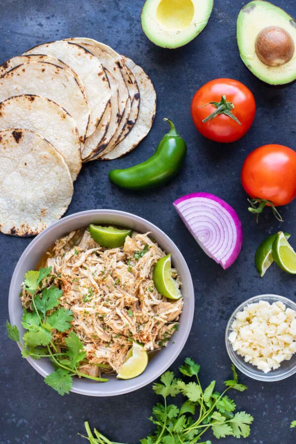 Easy Shredded Chicken Tacos - Evolving Table