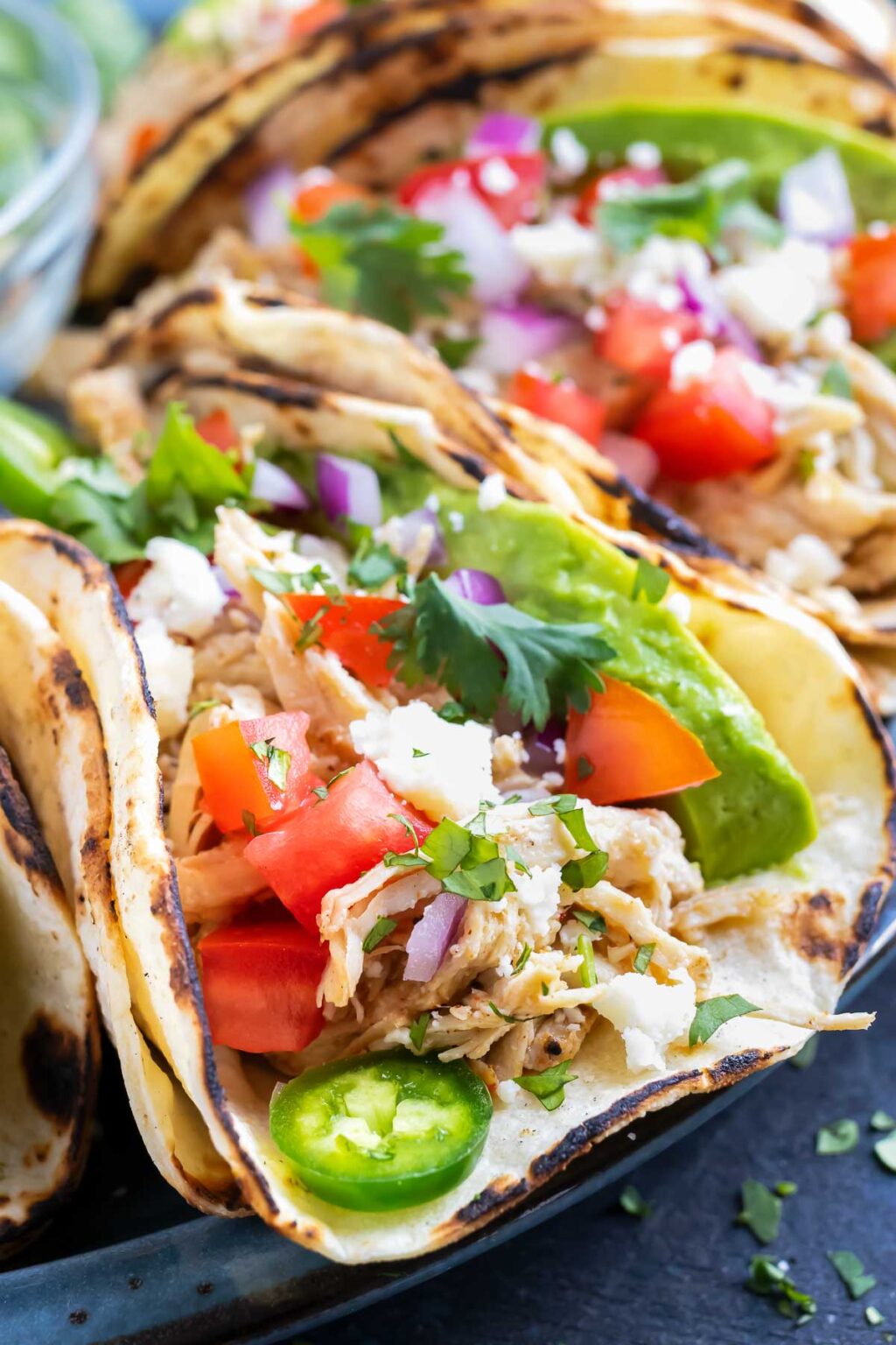 Easy Shredded Chicken Tacos - Evolving Table