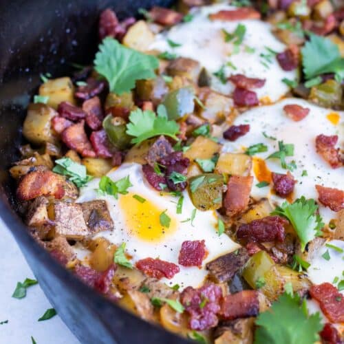 https://www.evolvingtable.com/wp-content/uploads/2023/08/Breakfast-Hash-Eggs-14-500x500.jpg