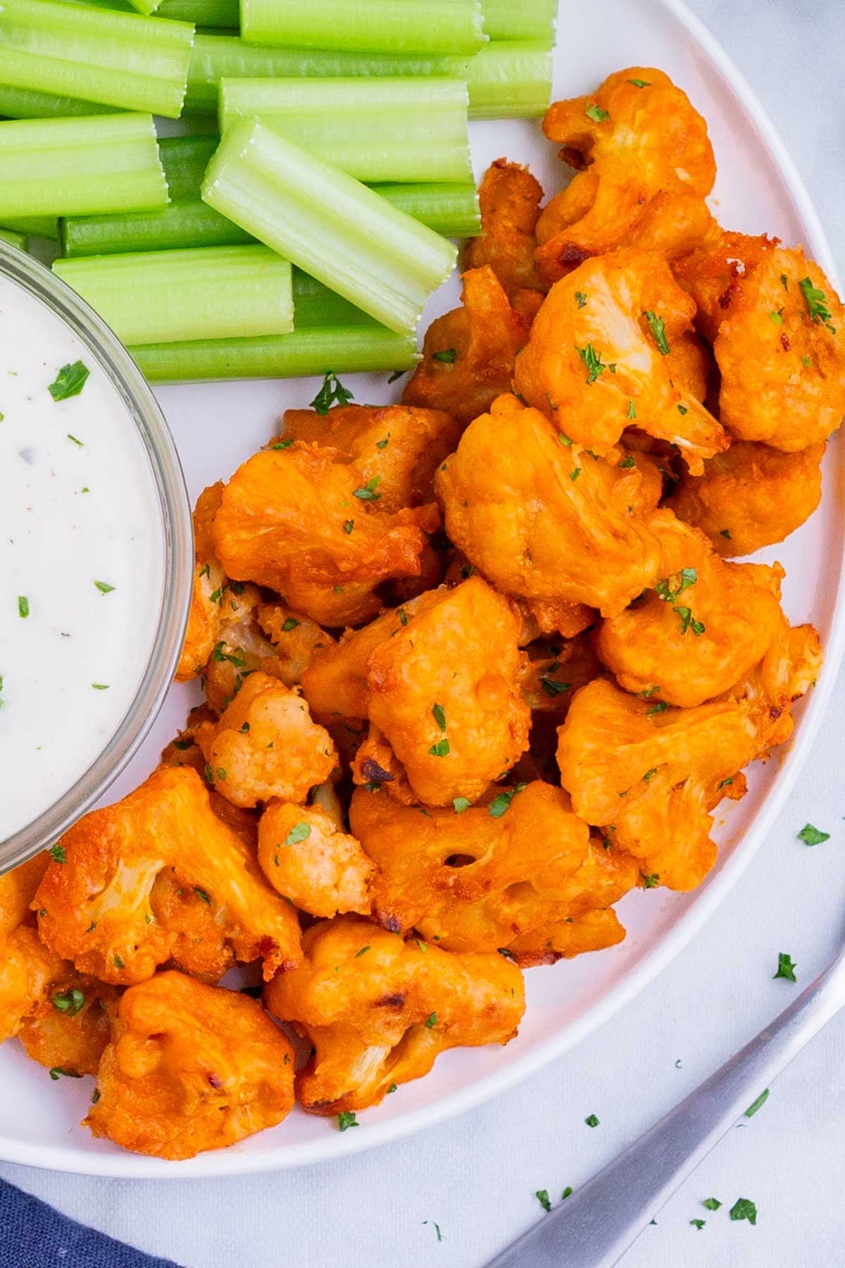 Easy Buffalo Cauliflower Bites Recipe - Evolving Table