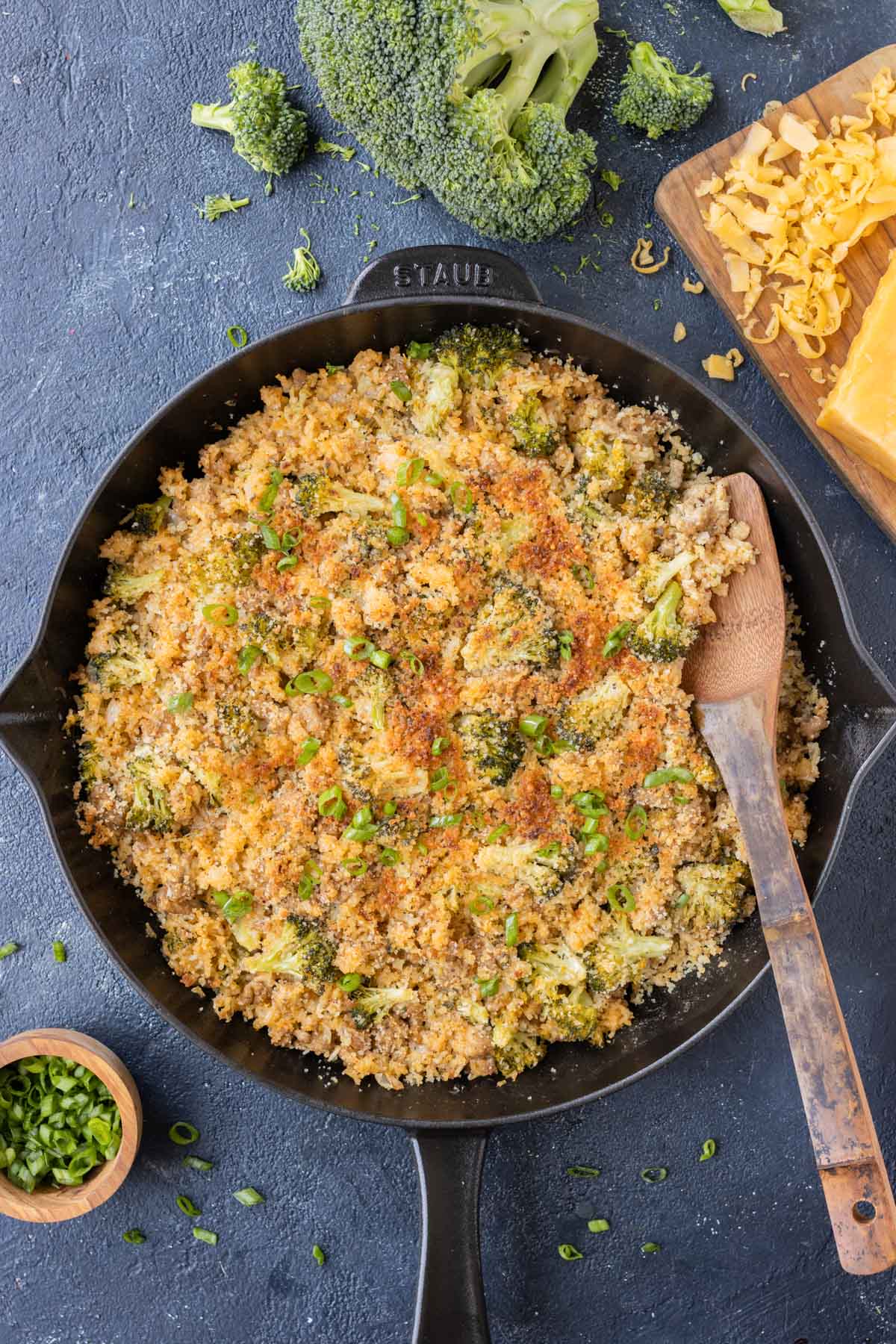 The cheesy broccoli, rice, and turkey dish is cooled in a skillet.