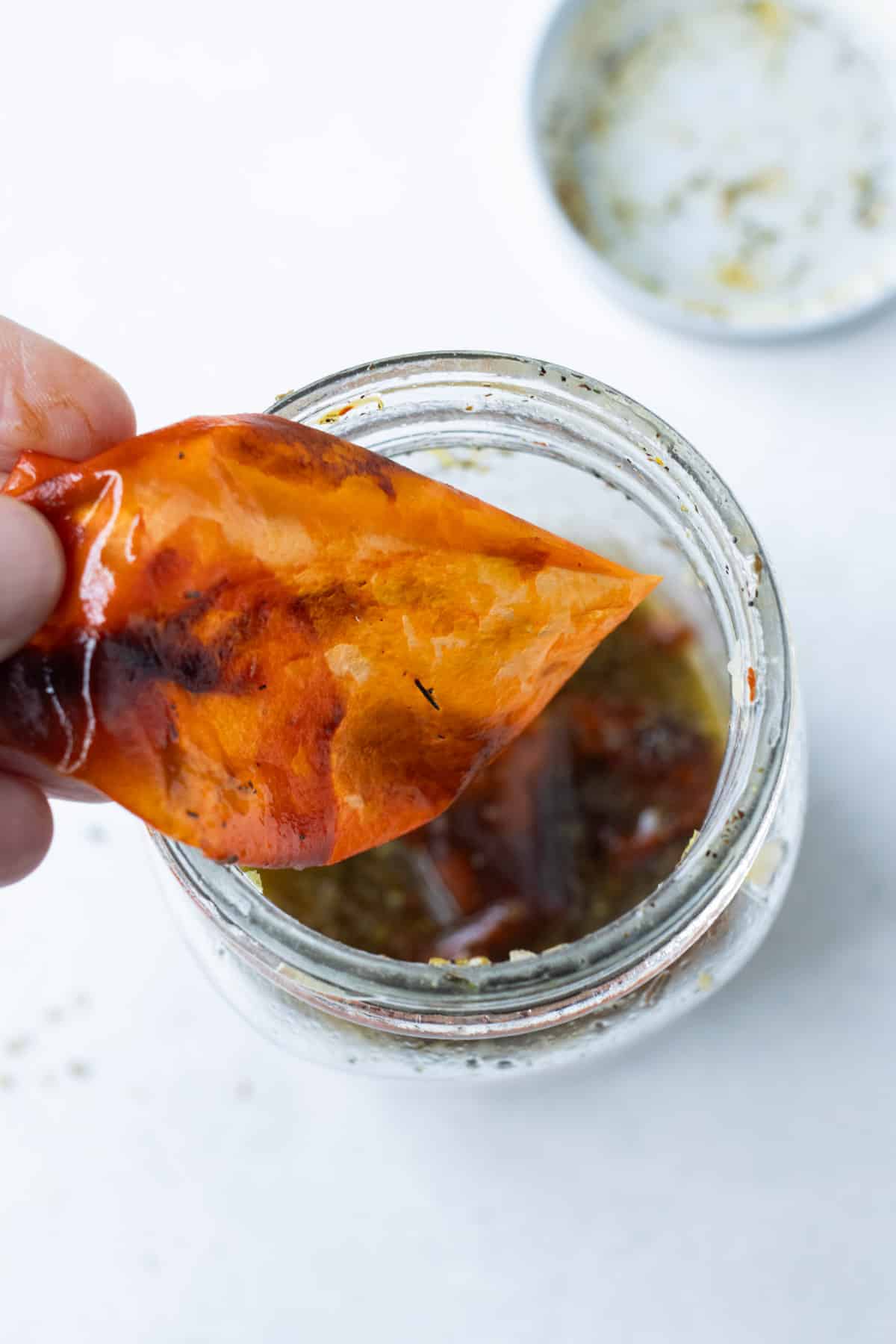 A bell pepper skin is added to the lemon dressing.