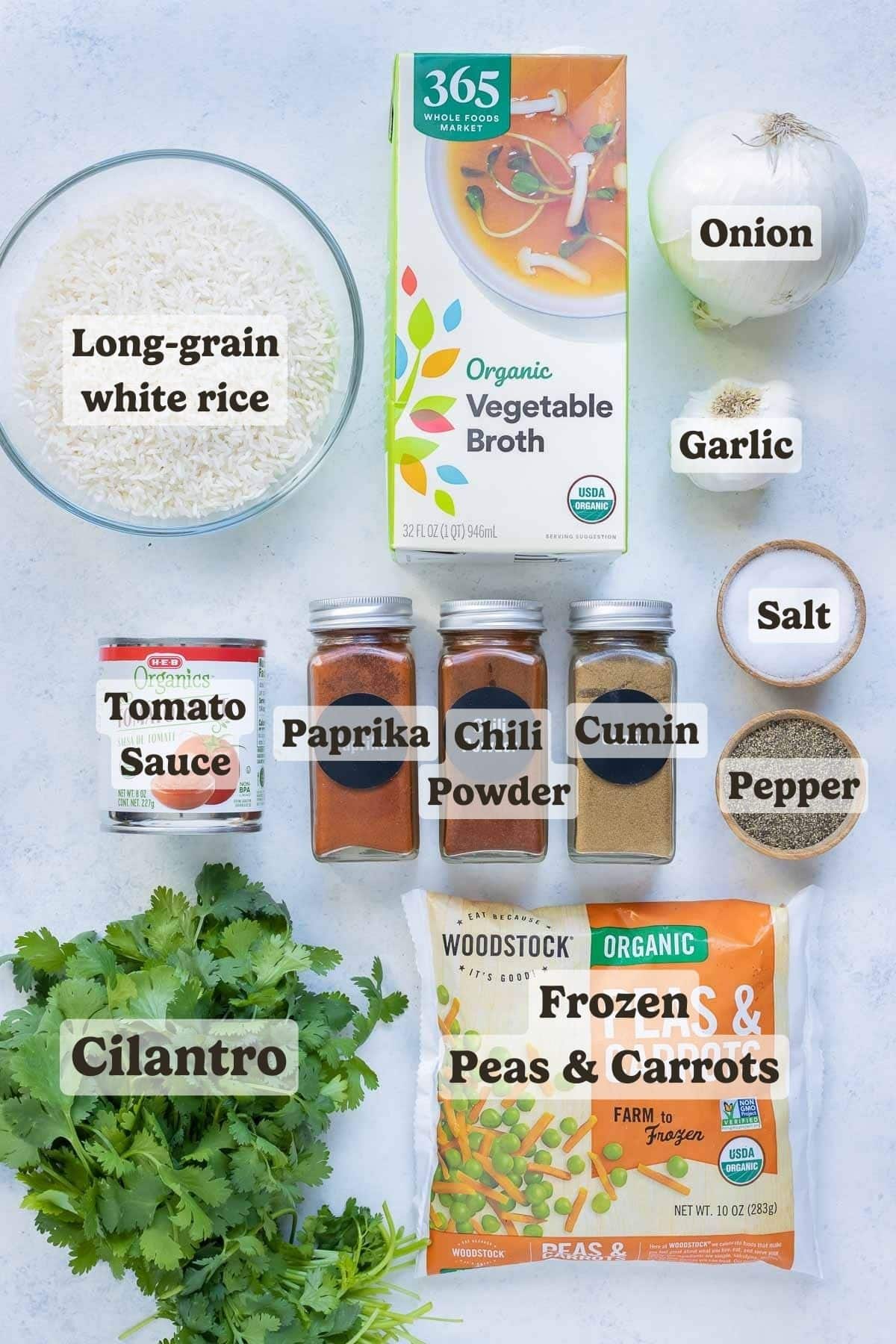 The ingredients for a restaurant-style Mexican rice recipe are on a table.