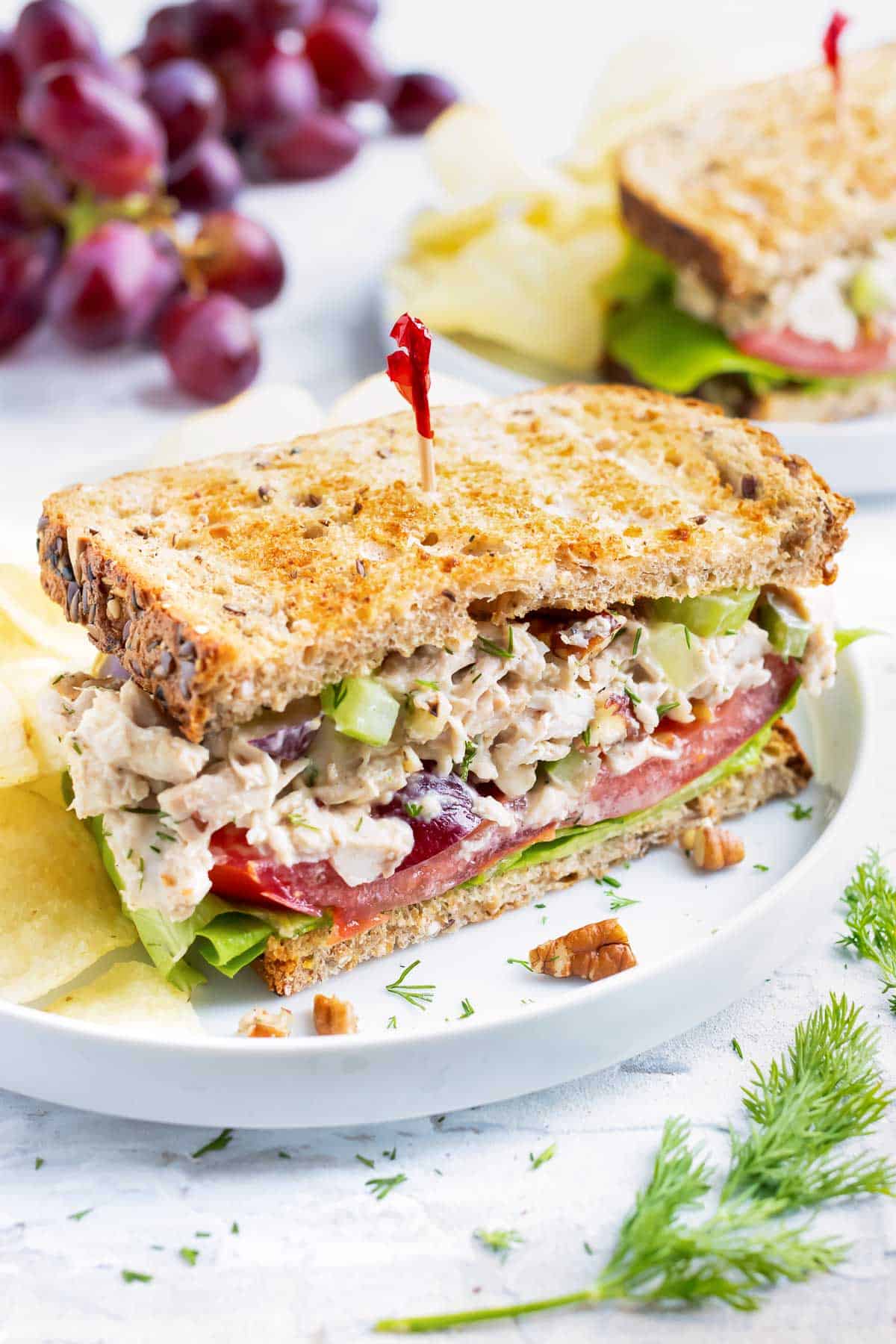 This tasty turkey salad recipe is served on a sandwich.