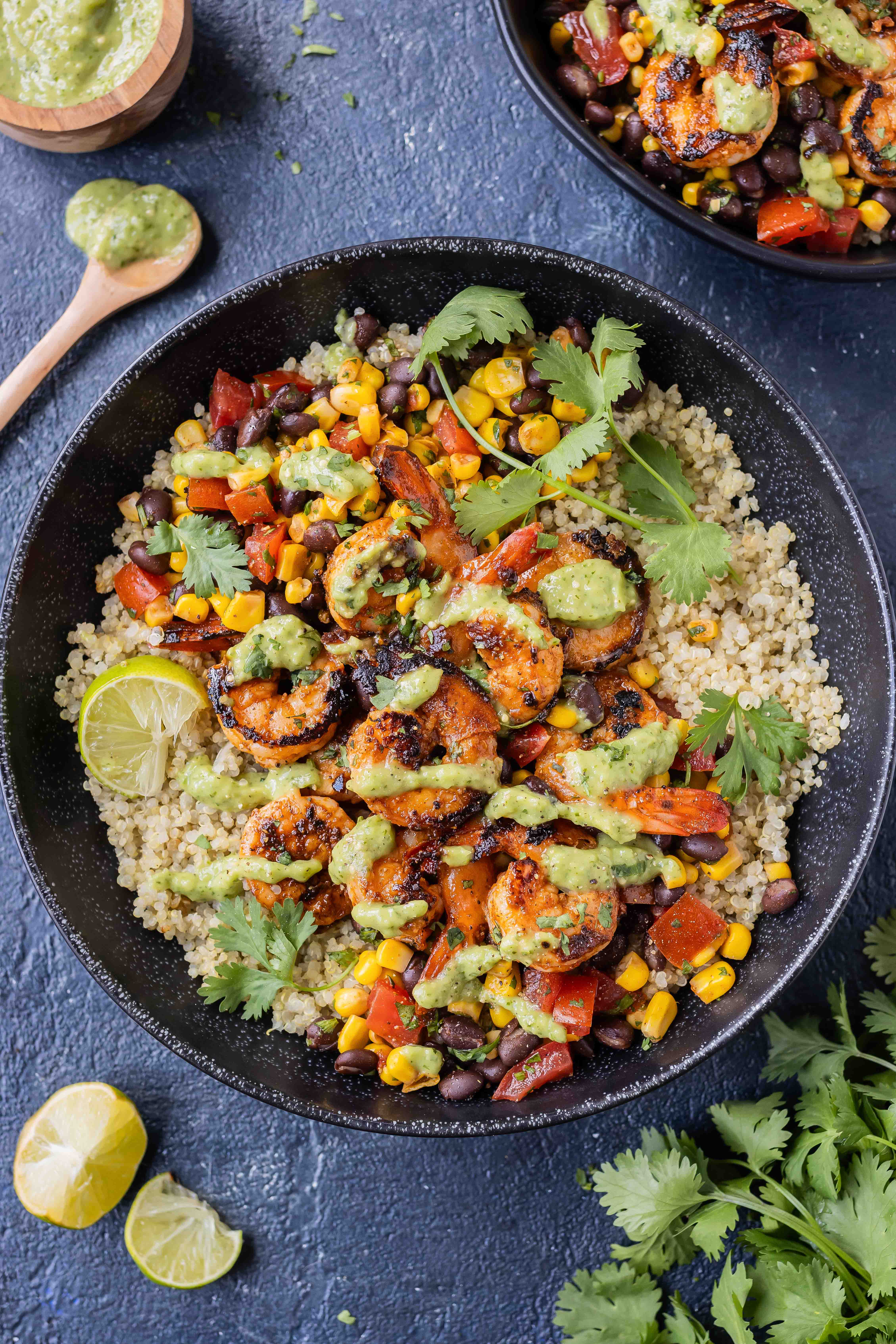 Chili Lime Shrimp Quinoa Bowls RECIPE served in a black bowl.