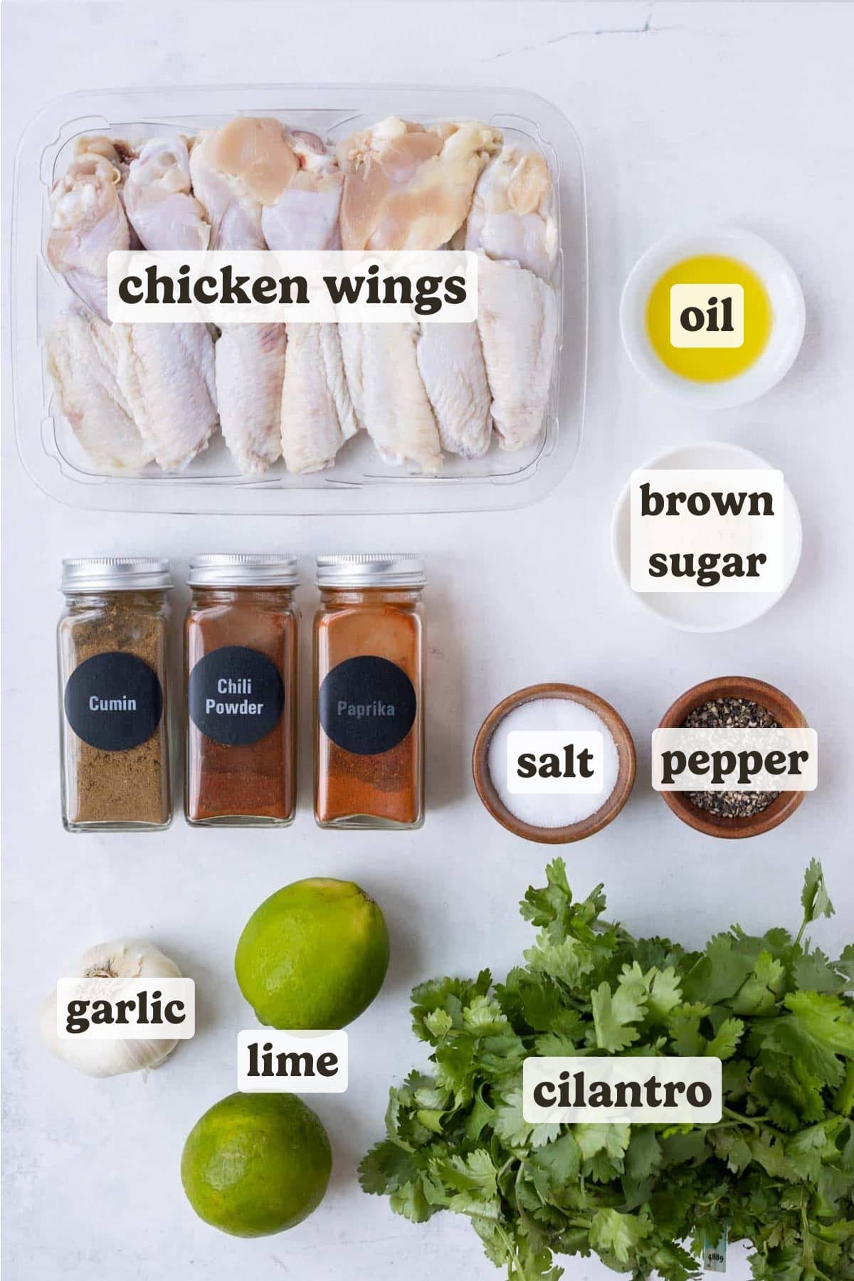 Chicken wings, cilantro, lime, garlic, oil, and seasonings are the main ingredients for cilantro lime chicken wings.