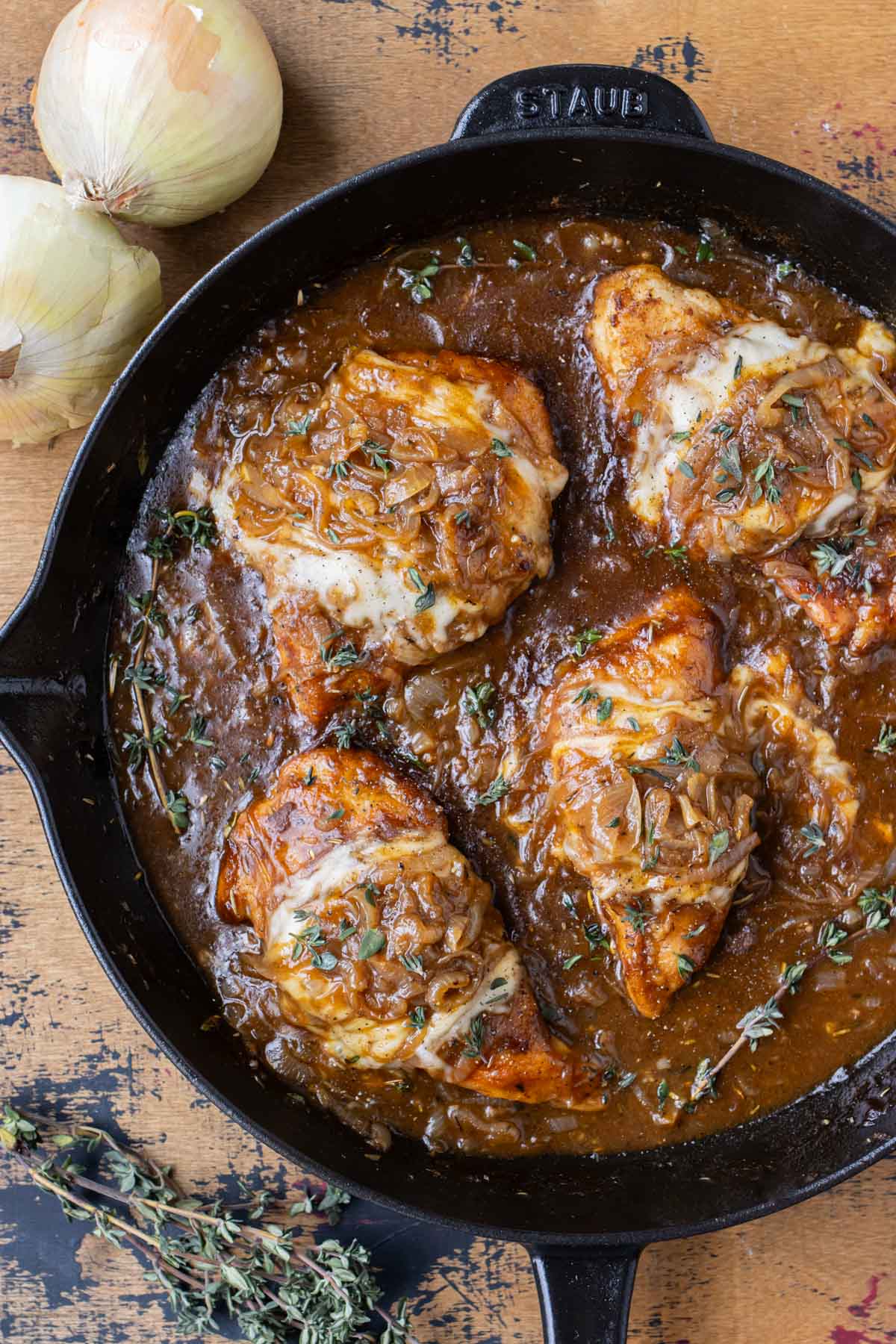 French onion chicken is cooked in a cast iron skillet for an simple dinner the whole family will love.