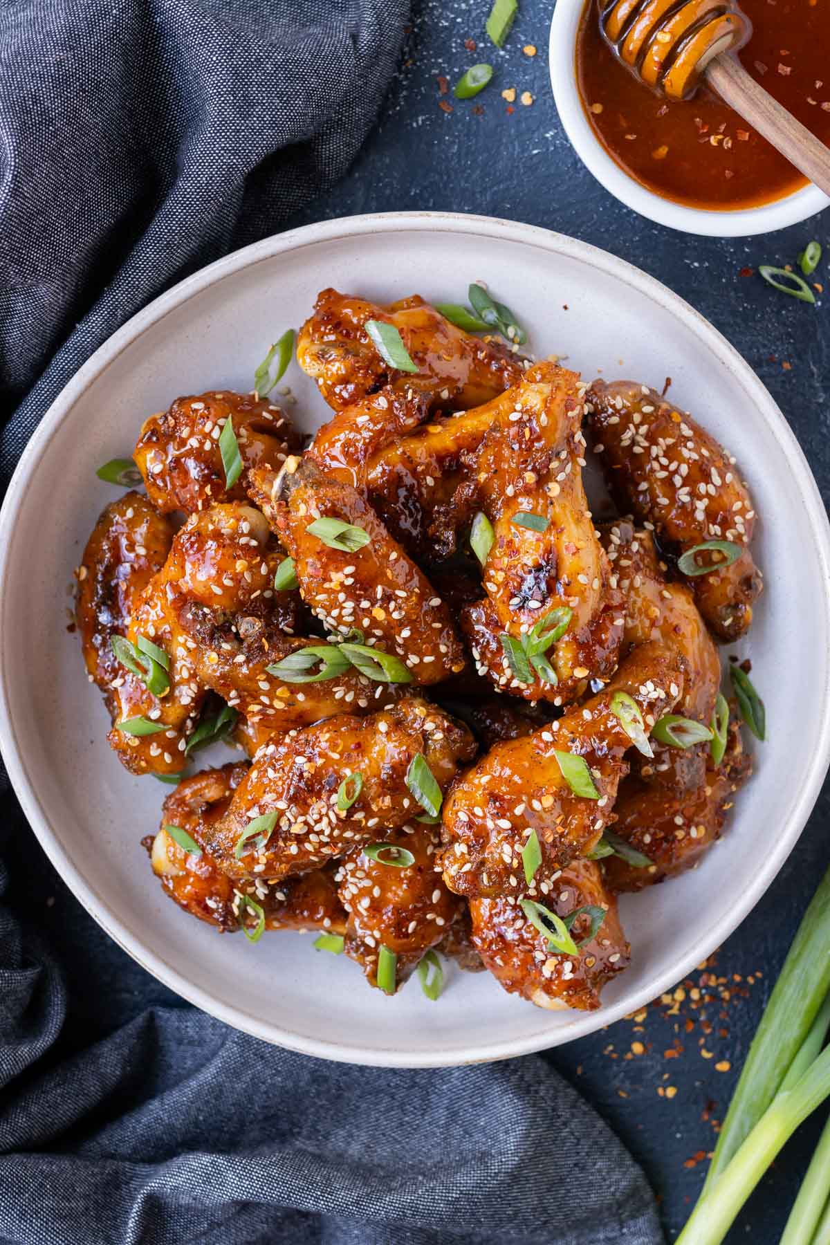 Hot honey chicken wings are sweet and spicy.