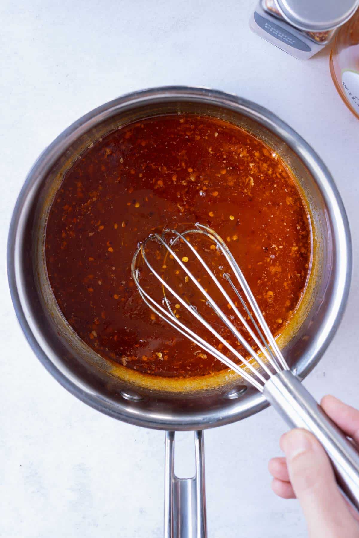 Hot honey is made in a sauce pan.