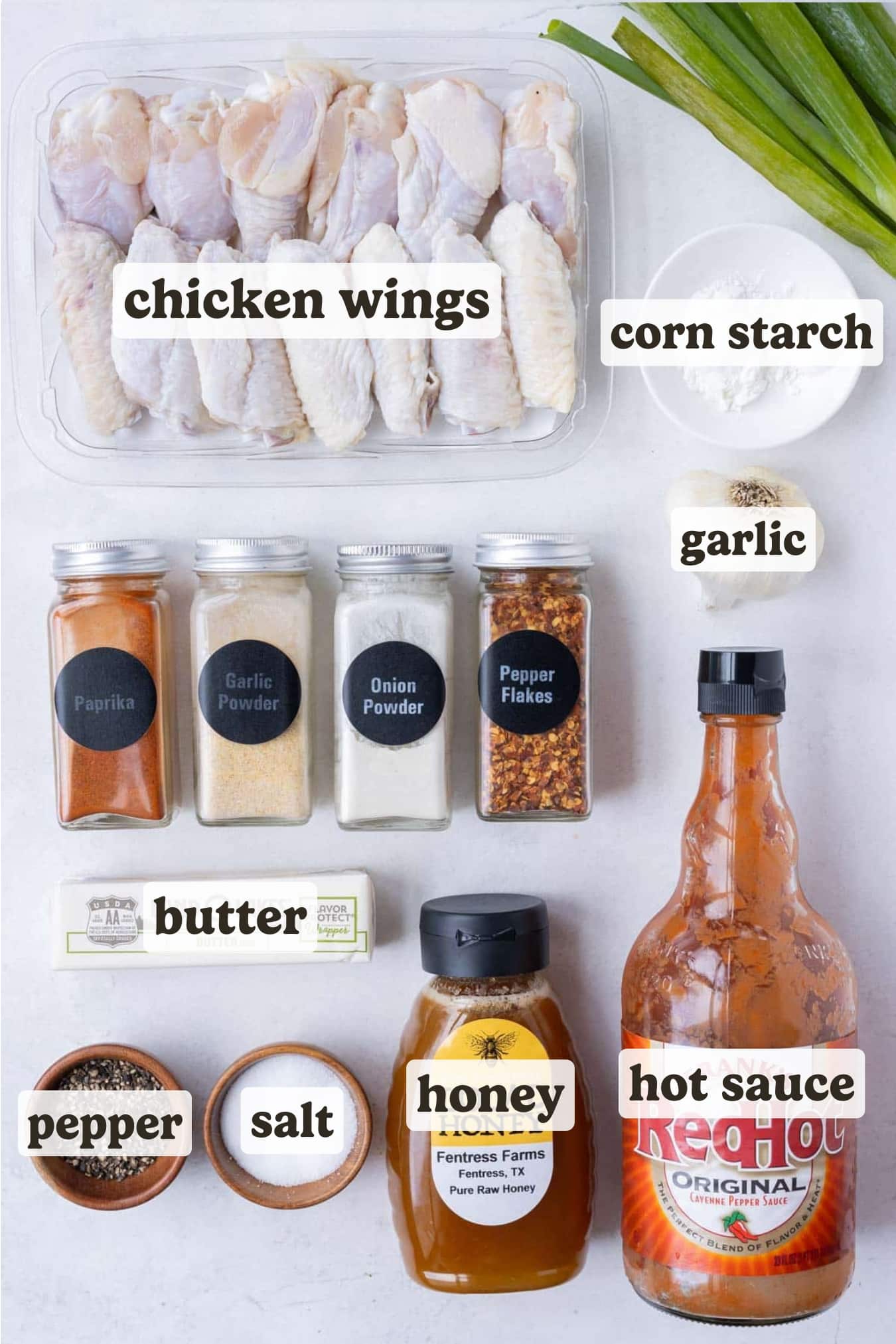 Chicken wings, hot sauce, cornstarch, honey, and seasonings are the main ingredients for these hot honey wings.